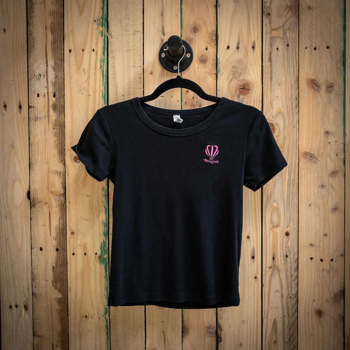 Boujon Bakery women's ribbed cropped tee in black, front with pink logo