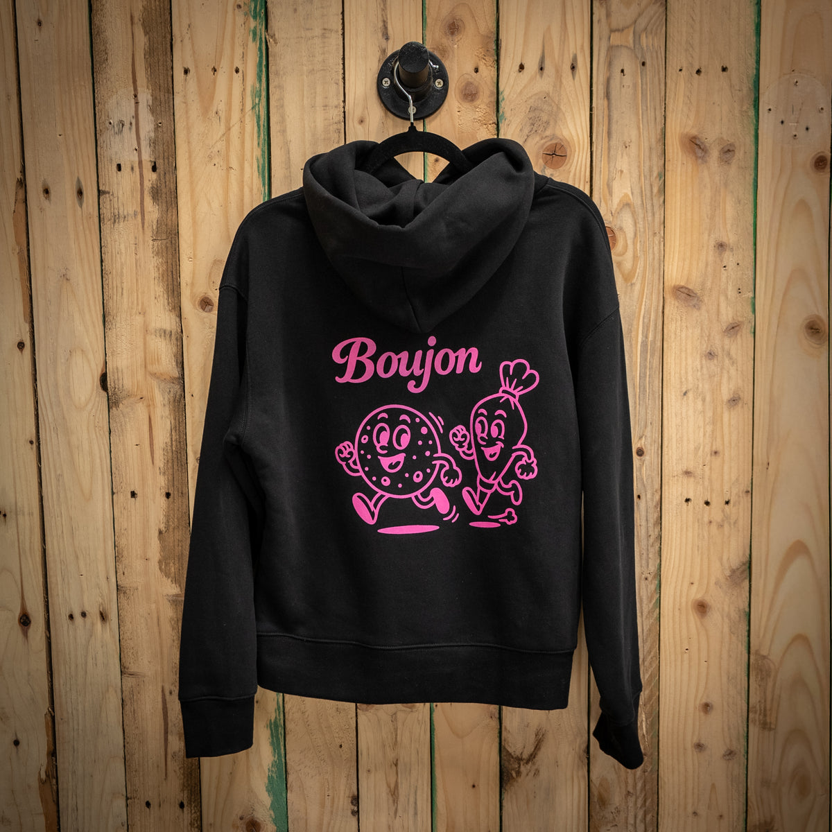Boujon Bakery men's relaxed fit hoodie in black, back with biscuit character print