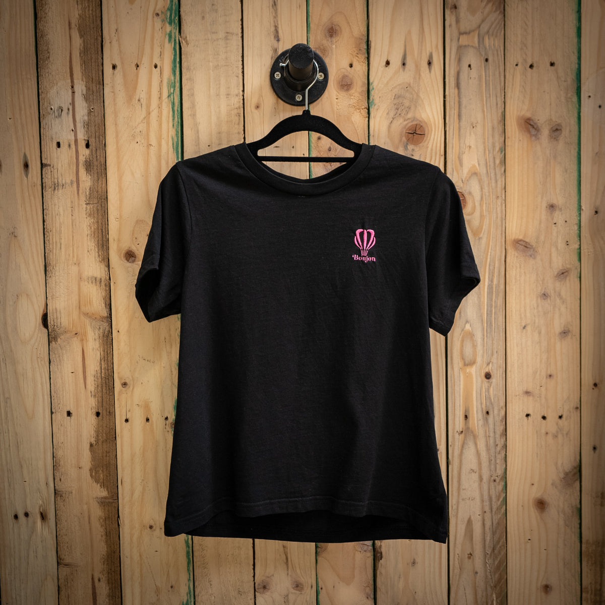 Boujon Bakery women's classic tee in black, front with pink logo